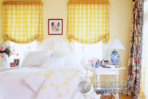 如何利用布艺窗帘营造温馨卧室氛围？