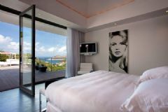 加勒比海绝美度假别墅现代卧室装修图片