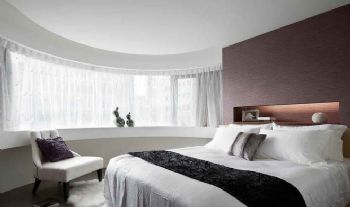 现代低调奢华三居装修案例现代卧室装修图片